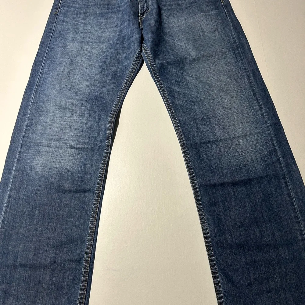 Levi’s 505 men’s denim‎ straight leg jeans, 33/30
